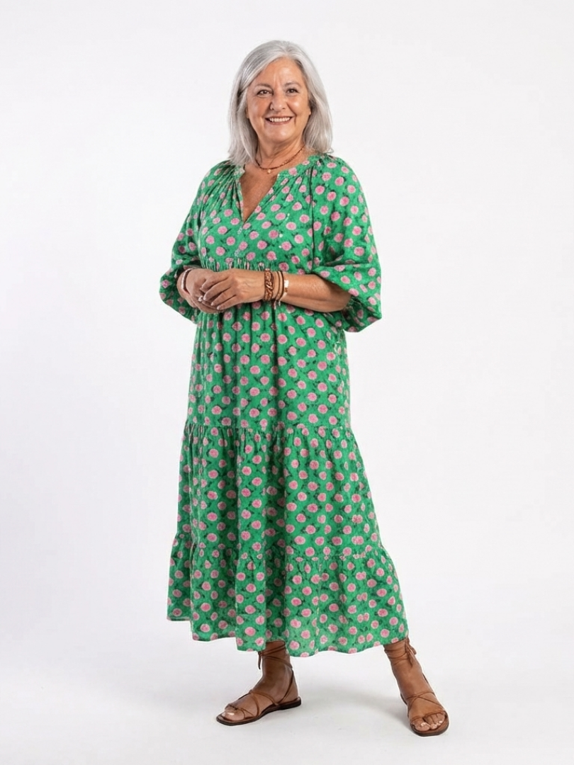Green floral print v-neck midi dress with long sleeves and tiered skirt