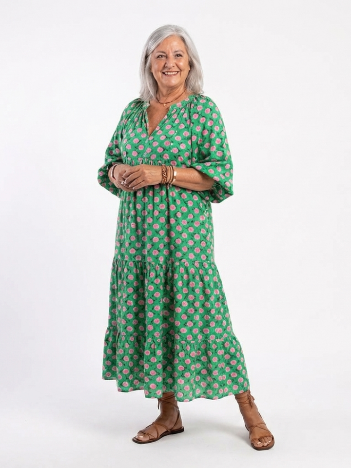 Green floral print v-neck midi dress with long sleeves and tiered skirt