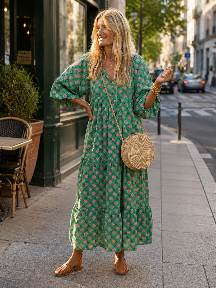 Green floral print v-neck midi dress with long sleeves and tiered skirt