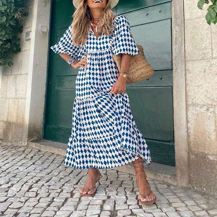 Blue and white diamond print midi dress with v-neck and puff sleeves